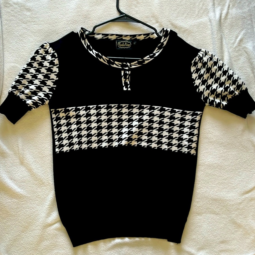 Black sweater with houndstooth trim